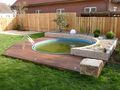 Pool mit Holzterrasse
