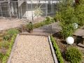 Holzterrasse mit Kies